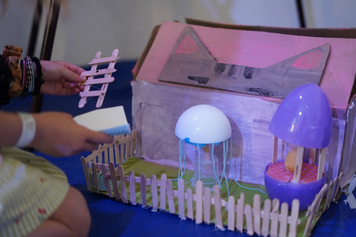 floor of cardboard buildings — a tiny city